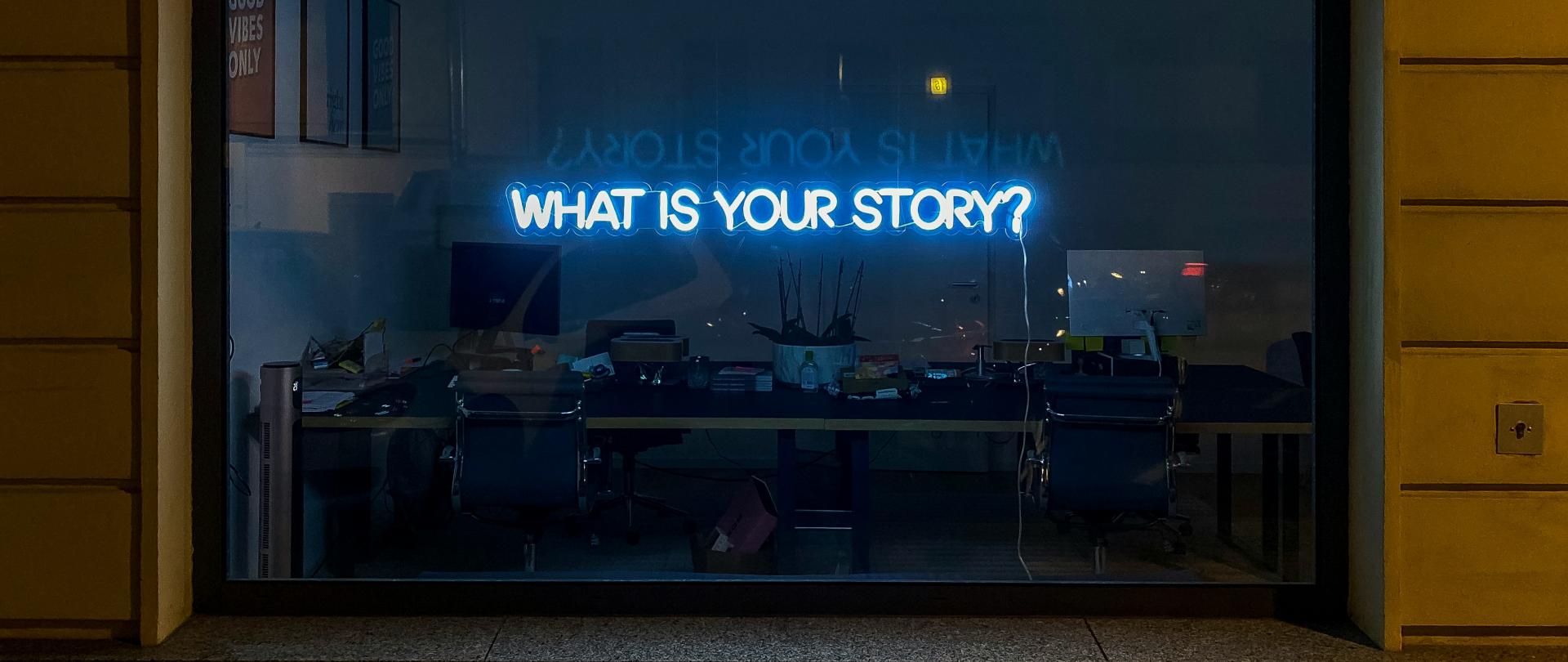 What is your story? Words projected on a window. 